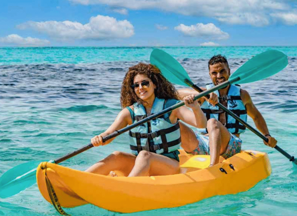 Two people in a yellow kayak